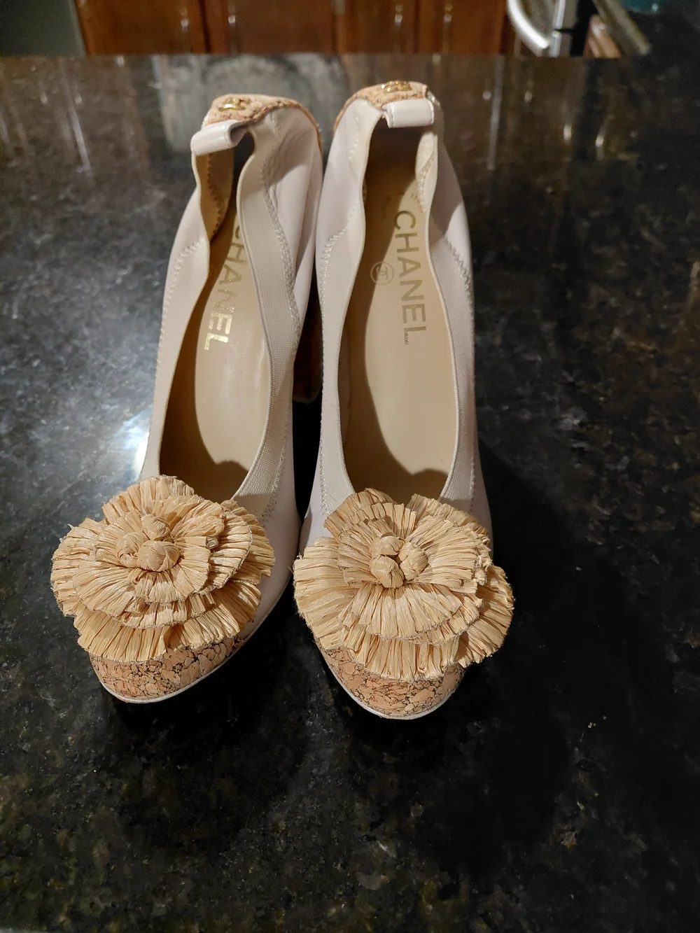 CHANEL Beige Leather Pumps with Cork Toe and Raffia Flower